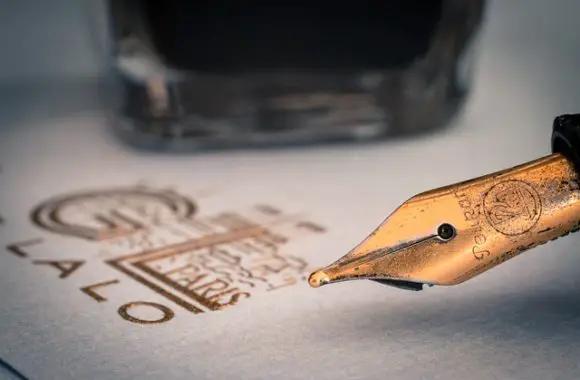 fountain pen with gold lettering